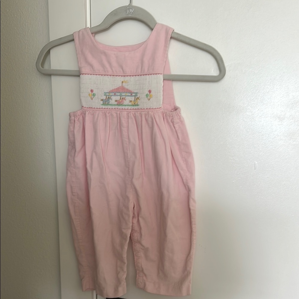 Smocked one piece carousel